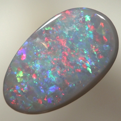 SOLID SEMI BLACK OPAL Bright sparkling reds over green and blue